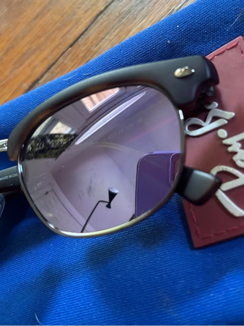 Ray-Ban junior Clubmaster Black Frame Sunglasses with Purple mirror Lenses